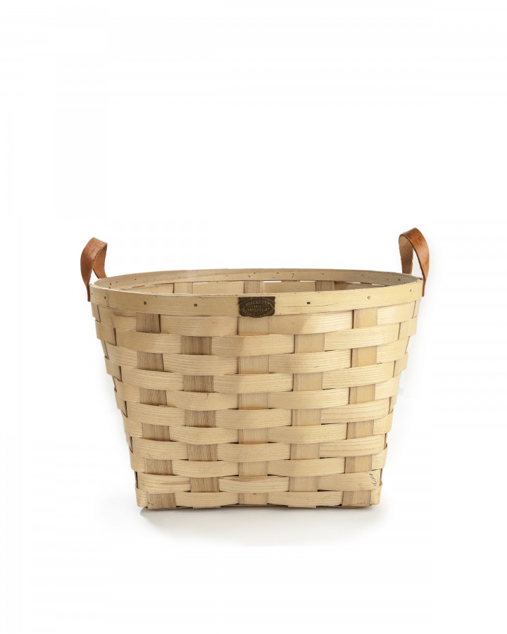 Even the container can be a gift, as with this beautiful, functional laundry basket. (All items from Judy Maxwell Home) (Bill Hogan/Chicago Tribune/TNS)