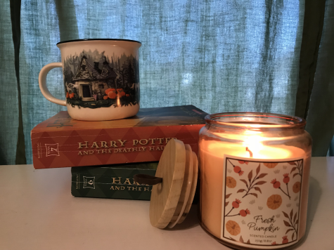 Lighting some candles and reading well-loved books invites an atmosphere synonymous with Hygge.