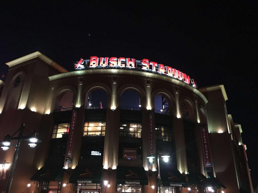 Bush Stadium at night lit up by all of the lights.