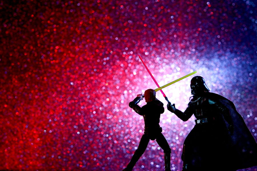 This is a toy recreation of the Luke Skywalker and Darth Vader lightsaber duel as depicted on the original Star Wars: Return of the Jedi movie poster.
