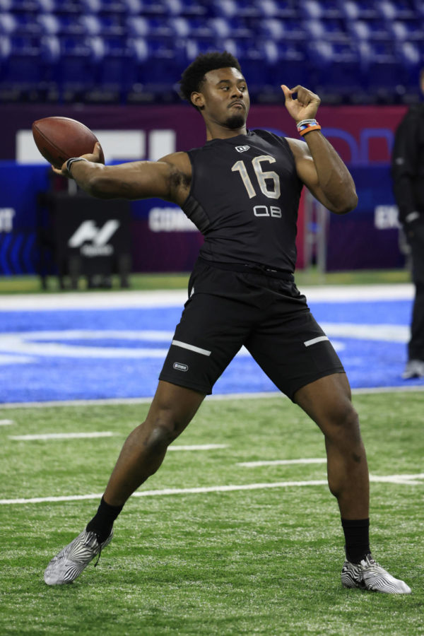 Quarterback Malik Willis throwing a football at the NFL combine.