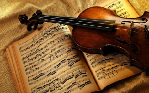 A classical score and violin.