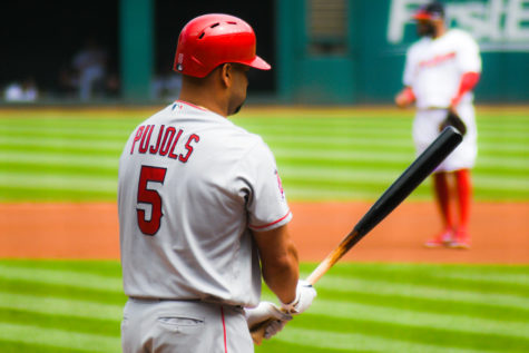 Albert Pujols breathes heavily as he steps up to the plate.