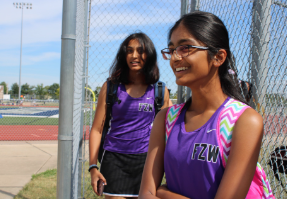 Sophomore varsity player, Isha Chaufhari enters the Timberland tennis courts for her first match of the season. Before she was able to make it to the courts, the team takes a bus that leave from the school. “I love to go on the bus with the team,” Chaufhari said. Its a really cool experience because everyone is nervous and excited.”