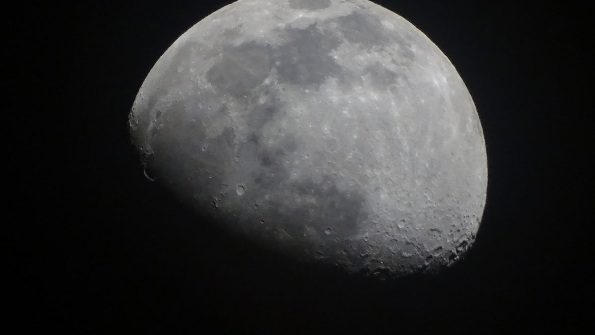 Close+up+photo+of+the+moon+and+some+of+its+craters.