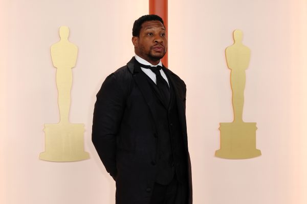 Jonathan Majors attends the 95th Academy Awards at the Dolby Theatre on March 12, 2023, in Los Angeles. (Allen J. Schaben/Los Angeles Times/TNS)