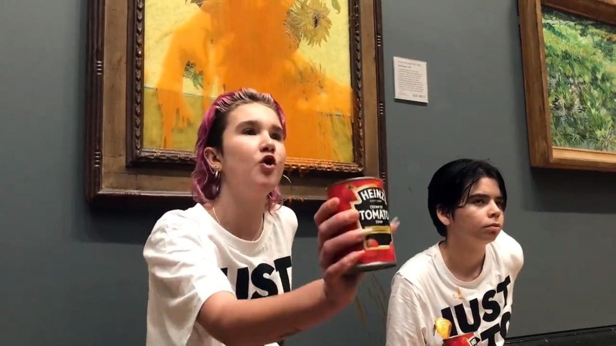 Just Stop Oil protesters glued themselves to the wall and then threw tomato soup at Vincent Van Goghs iconic 1888-9 art work Sunflowers, at the National Gallery on Oct. 14, 2022, in London. (Just Stop Oil/Zuma Press/TNS)