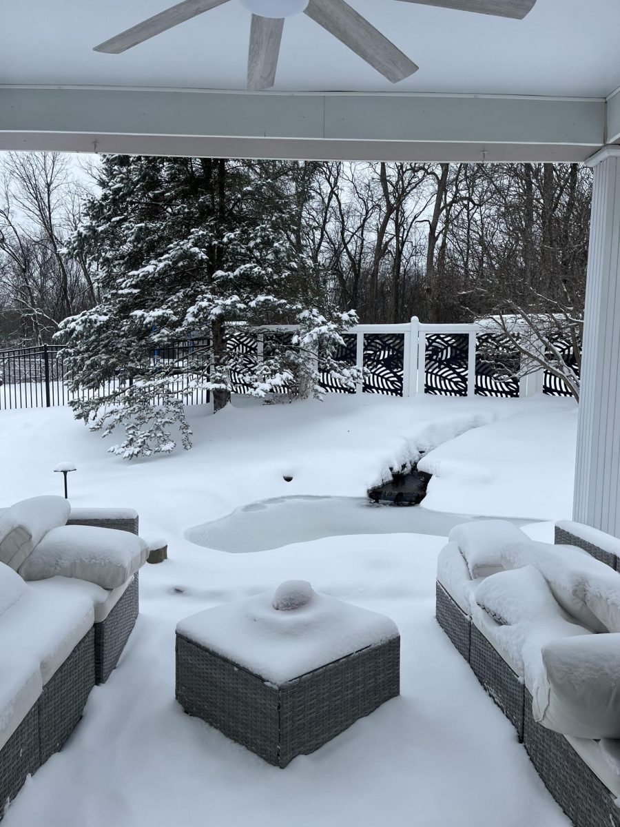 A backyard covered with snow